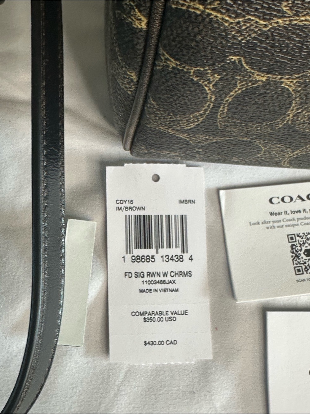 Coach Rowan Satchel Bag
In Loved Signature Canvas With Charms Brown and Gold - Picture 10 of 12